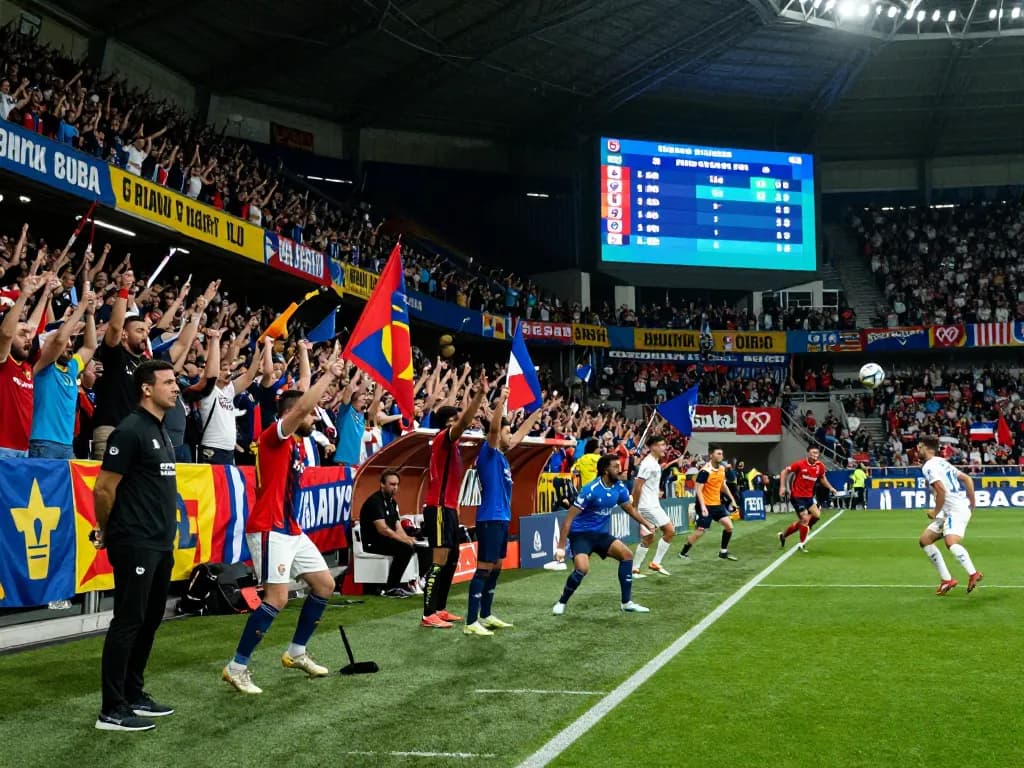 Live football action capturing Nowgoal's accurate score updates in an energetic stadium atmosphere.